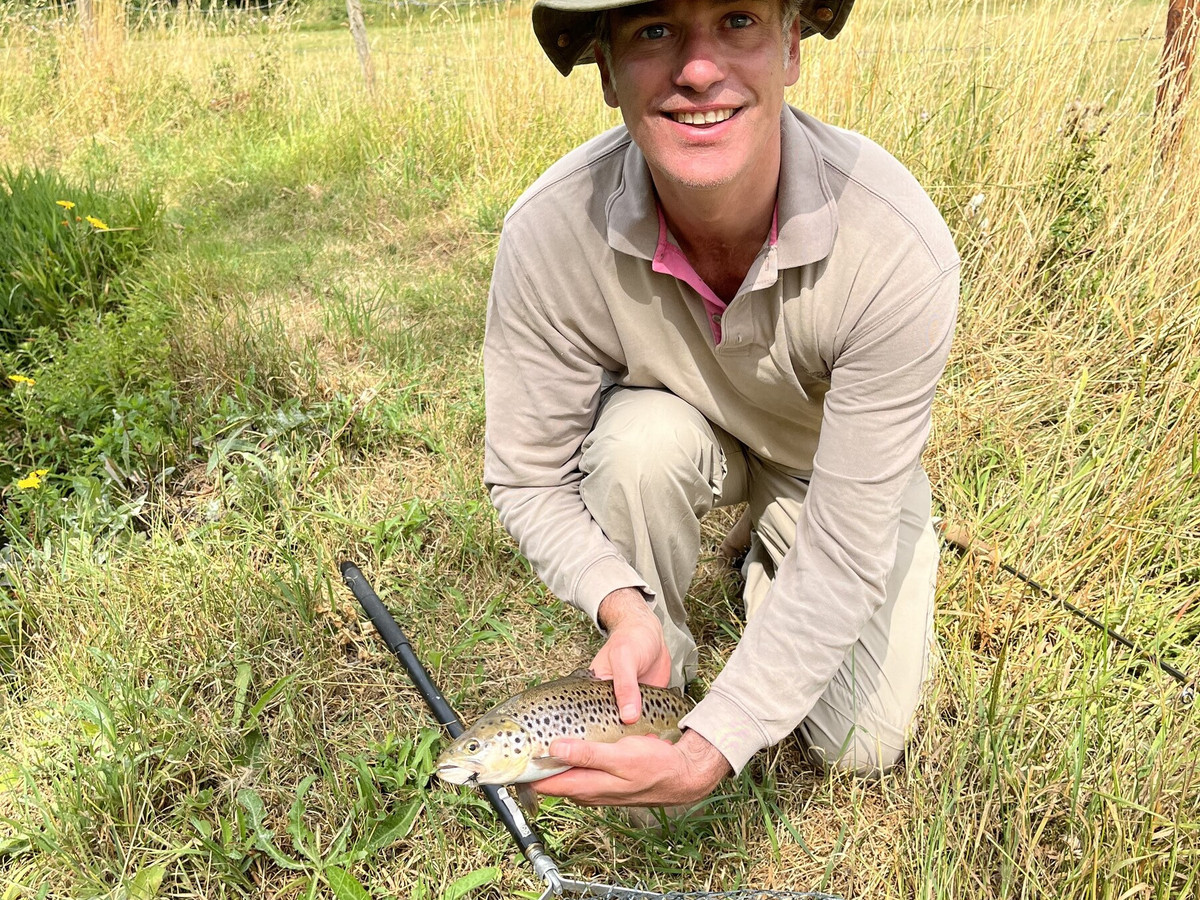 Charlie Atherton with a brown trout