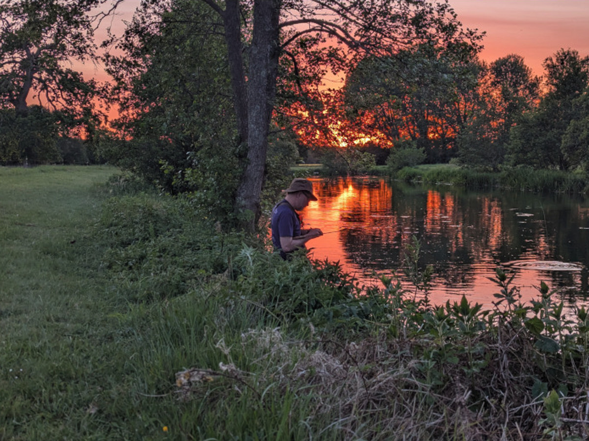 Picture of a fishermen fishing the river Test